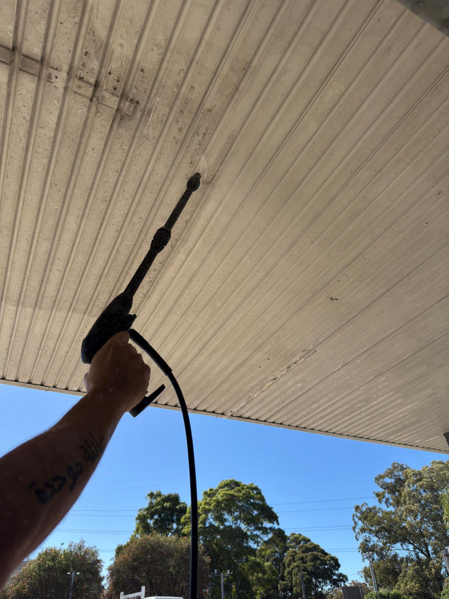 ShineMasters pressure washing in action, exterior clean Sydney